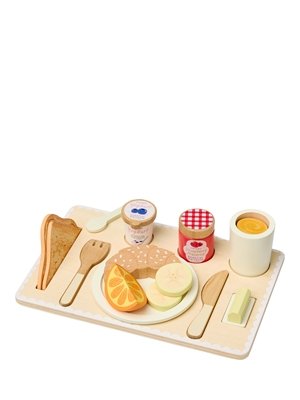 Wooden toy breakfast tray featuring cutouts for play food, including sliced bread, a croissant, orange and banana slices, a jam jar labeled Strawberry Preserve, yoghurt, and wooden utensils.